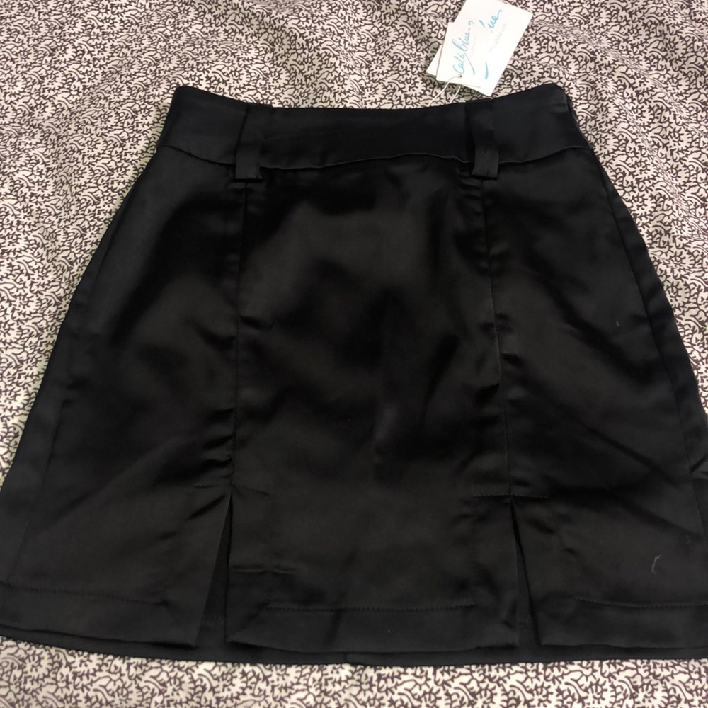 Satin mini skirt with two slits. Very cute! NWT